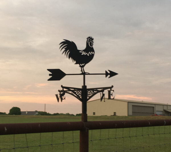 Rooster weathervane shown at sunset in Rhome Texas made by Scott Snyder