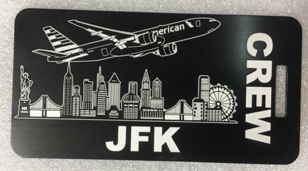 AA 777 bag tag over JFK black